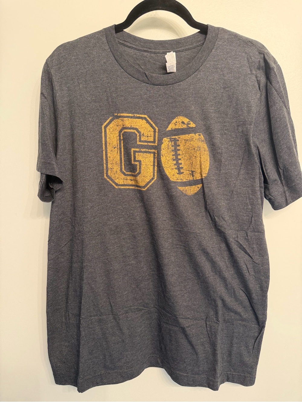 NEVERWORNBella Canvas Unisex Short Sleeve Tee - Grey with Gold Football Graphic